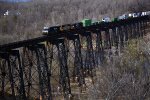 NS train 25A stretched out on the James River trestle. The trestle, part of Southern Railway's cutoff built around downtown Lynchburg, opened March 1, 1911.